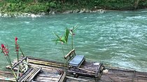 Bamboo Rafting with lime stone