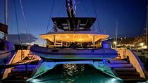 Mykonos Catamaran Sunset Cruise with Meal, Drinks & Transfer