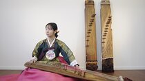 Play Gayageum in Hanbok Cultural Experience in Bukchon