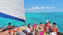 Private Catamaran to Isla Mujeres: Snorkel, Party & Beach Club 