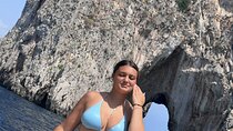 Emotional experience on a boat in Capri: Blue Grotto, Faraglioni.