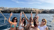 Group boat ride in Polignano between caves, swimming and aperitif