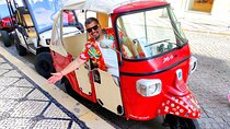 Discover Lisbon in 3 hours on a fun Piaggio Tuktuk