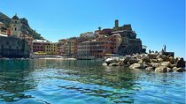 Private tour to Cinque Terre on a traditional Ligurian gozzo boat.