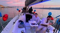 Sunset Sailboat Tour with Guide and Open Bar Green Wine In Lisbon