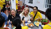 Saigon Night Street Food and City Tour on Scooter