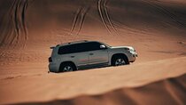Qatar Shared Desert Safari with Sandboarding and Camel Ride