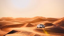 Abu Dhabi Evening Desert Safari: BBQ Dinner, Camel Ride & Shows