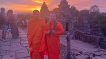 Exploring the Ancient Wonders of Angkor Wat with sunset backheng 