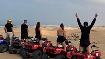 quad bike tour in the desert sand dunes