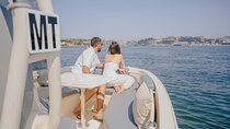 Guided boat tour with wine and sunset option.