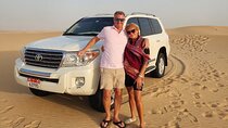 Evening Half Day Abu Dhabi Desert Safari Tour with BBQ Dinner