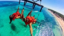 Parasailing above Turquoise Ocean Waters in Montego Bay 