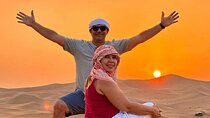 Sunset & sunrise Desert Safari with Sandboarding and Camel Ride
