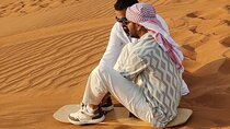 Abu Dhabi Desert Safari with Quad Bike, Camel Ride, & BBQ Dinner