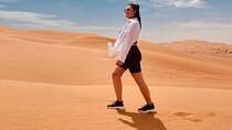 Dubai Desert Safari in Private Car, Camelride, Sandboarding & BBQ
