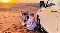 Dubai Desert Safari With BBQ Dinner, Sandboarding, Camel Ride