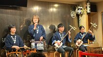 Tsugaru shamisen performance over traditional dinner