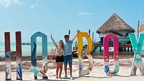 Holbox Island Trip with Boat Ride Biking and Swimming from Cancun