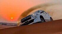 Sunset Desert Safari with Dune Bashing and Camel Rides Dinner