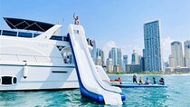 Yacht sailing with waterslides and BBQ from Dubai Harbour