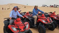 Abu Dhabi Desert Safari with Quad Bike, Camel Ride, & BBQ Dinner
