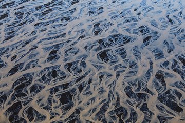 Sightseeing flight over black sands and riverbeds from Skaftafell Terminal