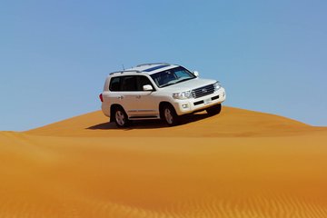 Dubai Red Dune Safari with BBQ Dinner & Live Shows from RAK