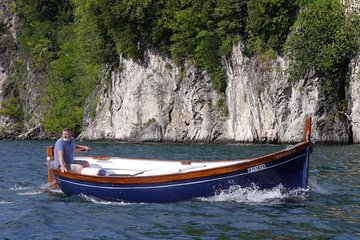 Slow boat tour for small groups with appetizer on Lake Maggiore