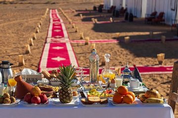 Merzouga: Overnight in Luxury Desert Camp with Camel Ride, meals & sandboarding