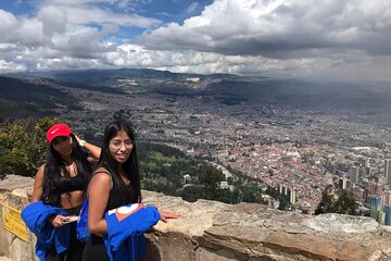 Experience Bogota visiting: Monserrate, City tour, Food and Museo Oro or Botero.