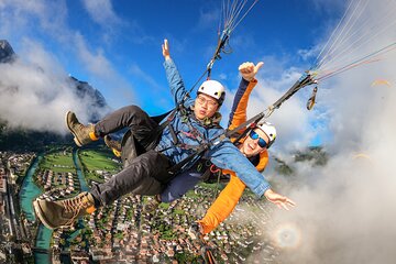Tandem Paragliding Experience with Transport from Interlaken