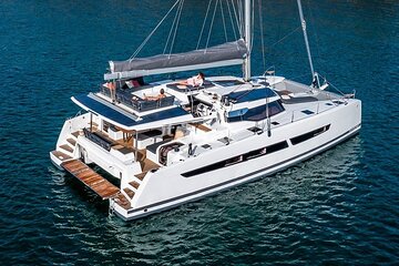 Semi-Private Brand-New Catamaran Cruise in Mykonos with Meal, Drinks & Transport